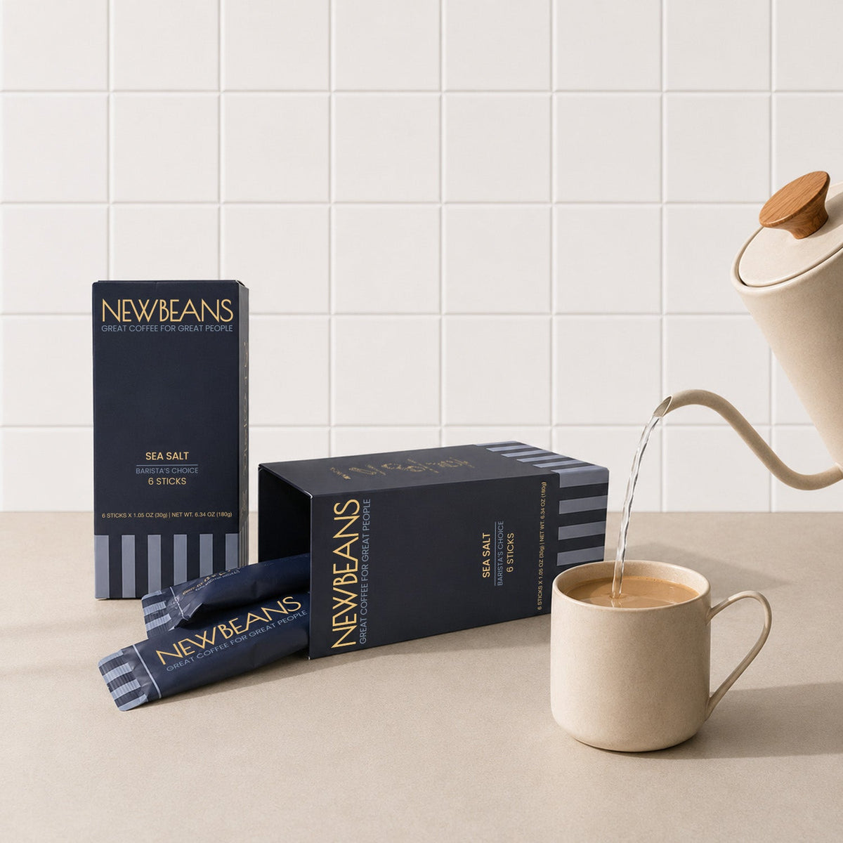 Newbeans Sea Salt box on a kitchen counter beside a freshly poured cup